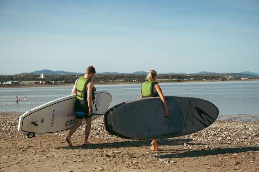 Baie de Beauport - couple avec planches à pagaie