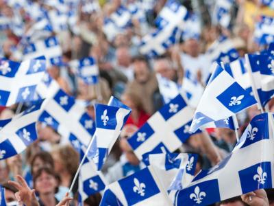 Crowd with Quebec flags
