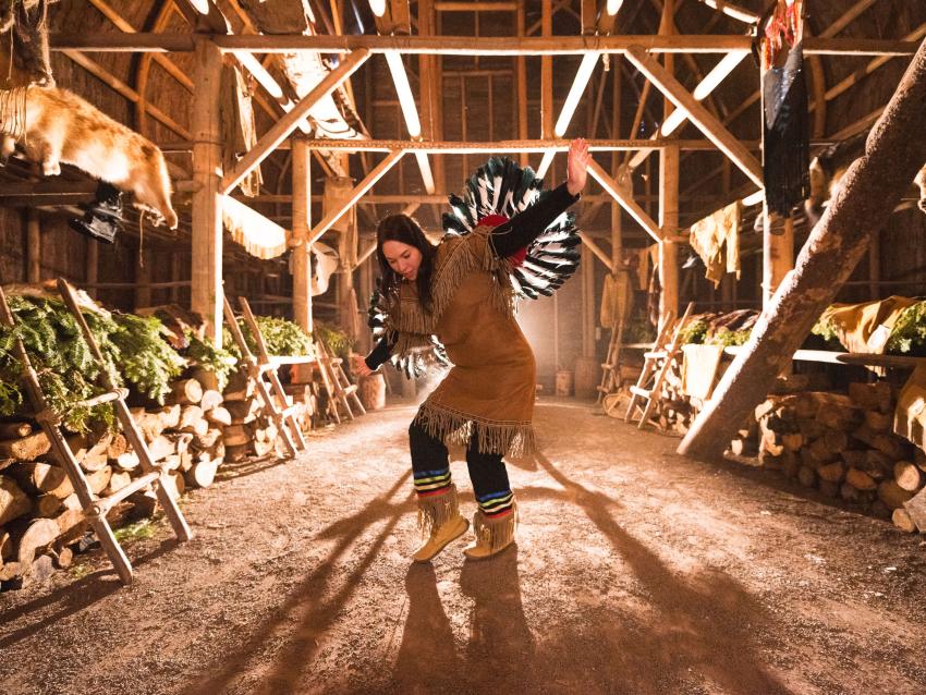 A Native American dancer performs a traditional dance inside the longhouse in Wendake, near Québec City.