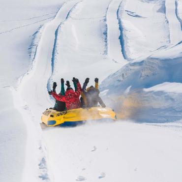 A group is rafting on snow at the Village Vacances Valcartier, near Québec City.